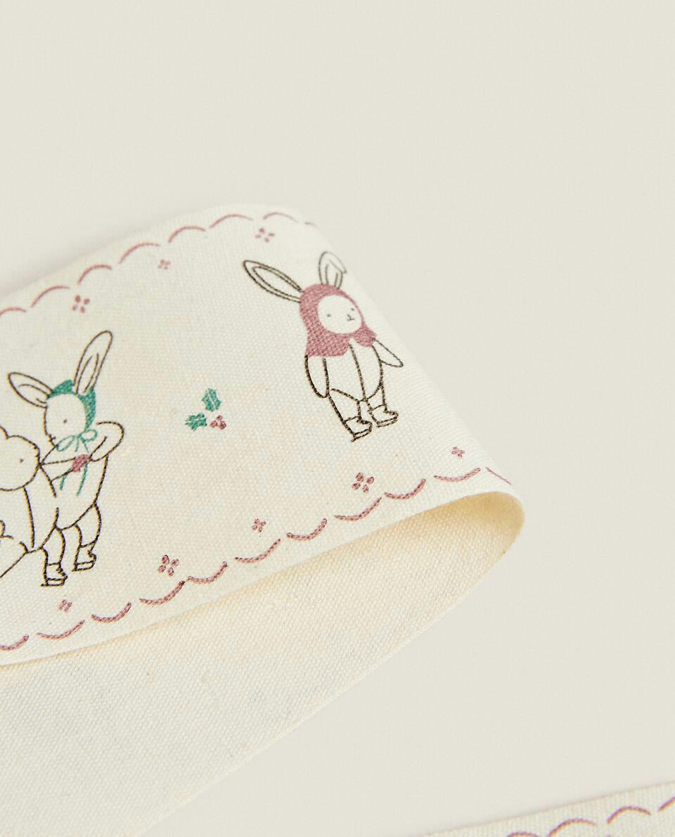 CHILDREN’S WRAPPING PAPER WITH CHRISTMAS BUNNY RABBITS