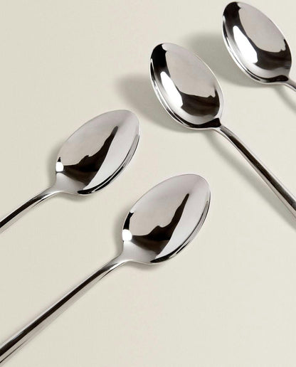 BOX OF 4 SHINY STEEL SPOONS