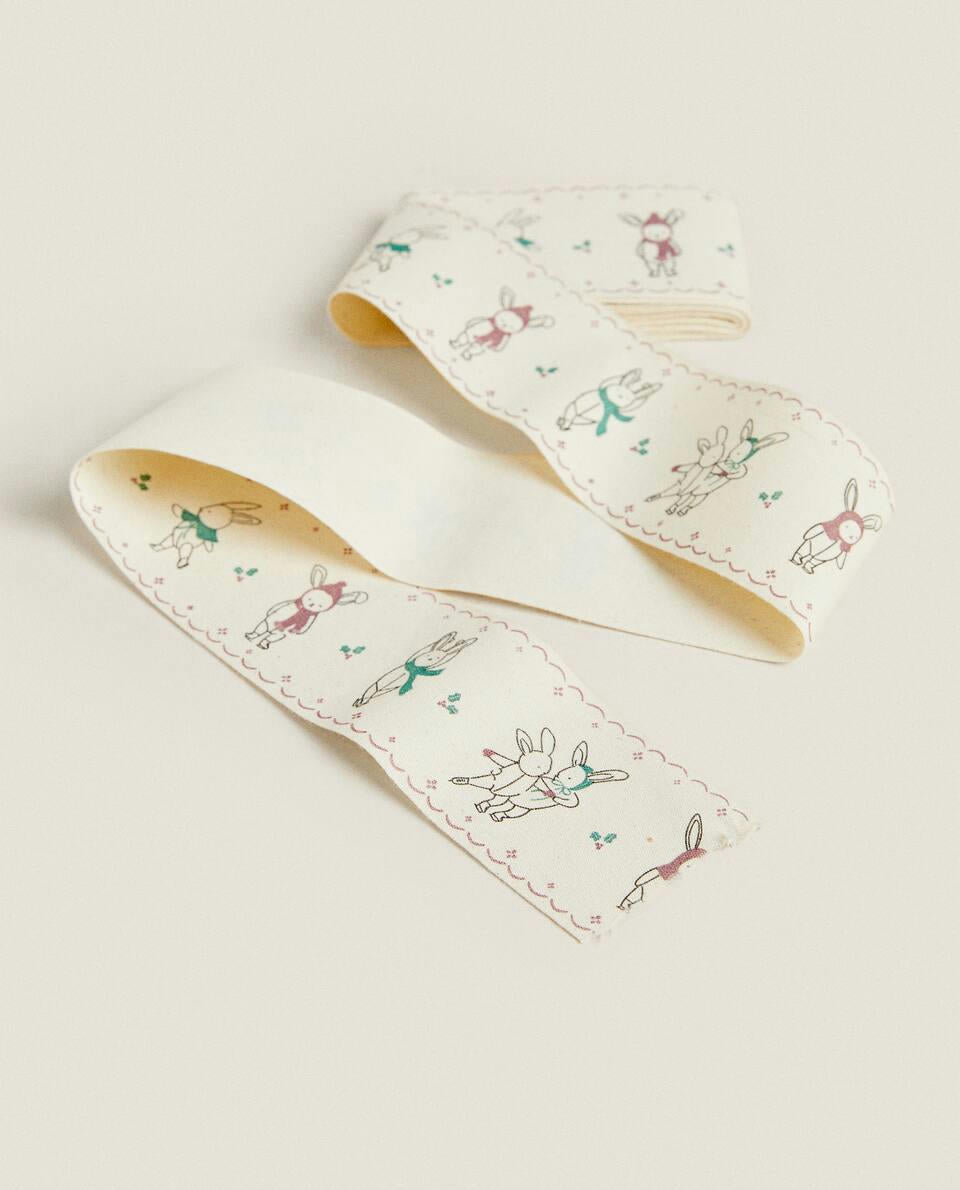 CHILDREN’S WRAPPING PAPER WITH CHRISTMAS BUNNY RABBITS