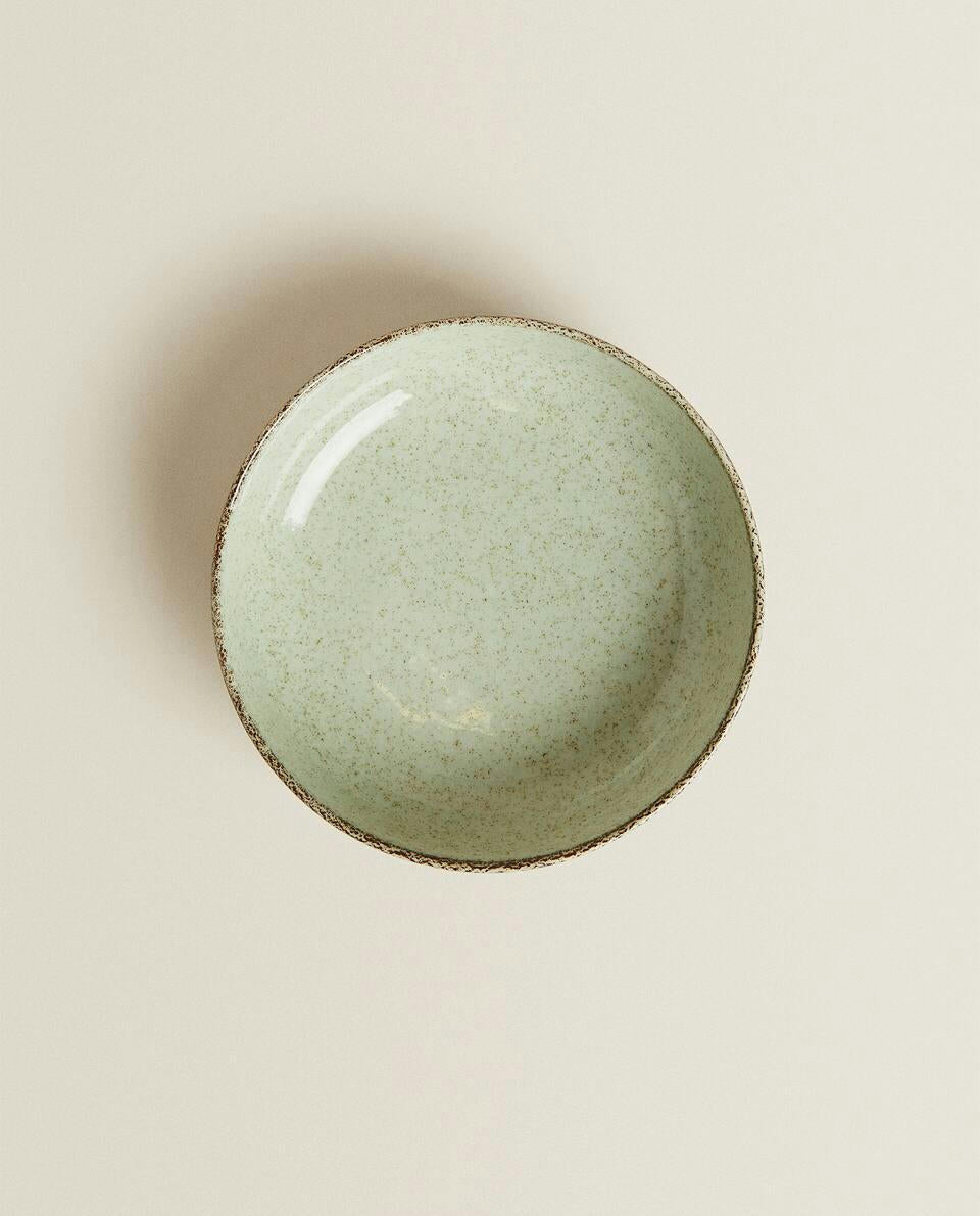 PORCELAIN BOWL WITH ANTIQUE FINISH RIM